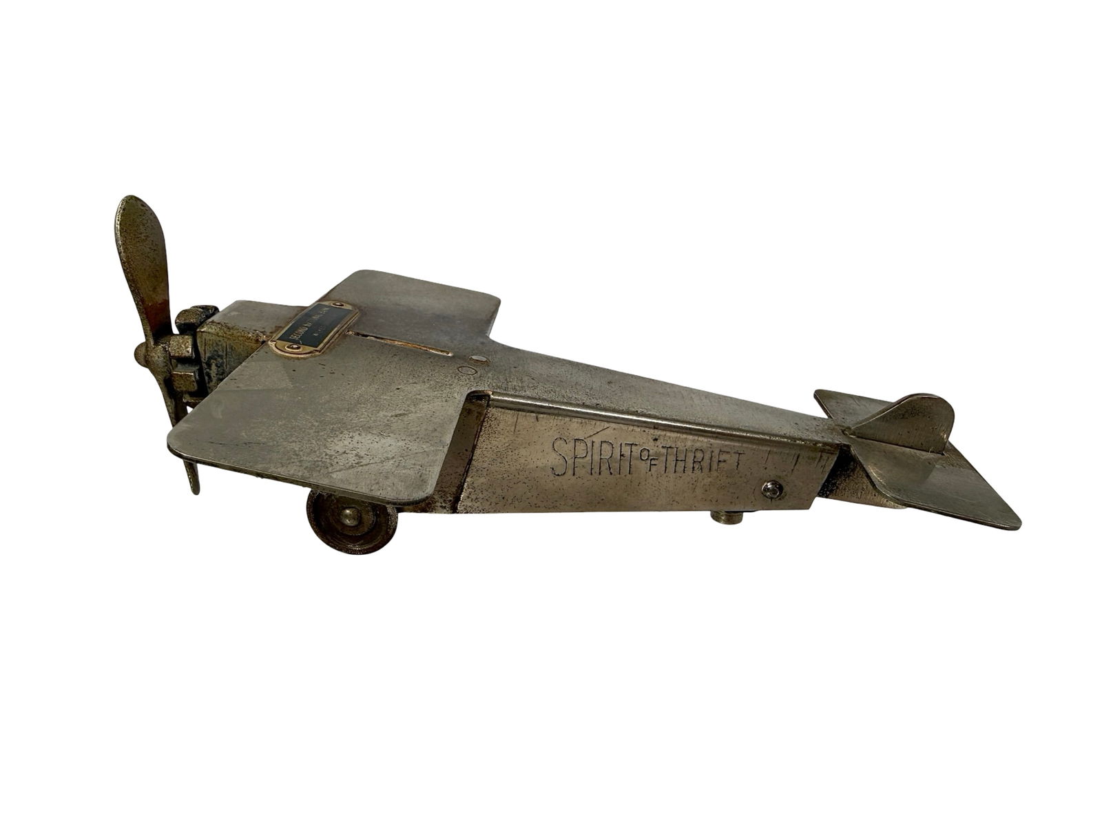 Spirit of Thrift Airplane Bank: American 1930. 7 3/4" Long x 5 1/8" Wingspan. The Peirce Collection.