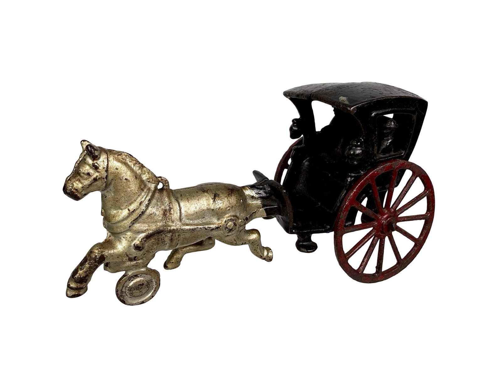 Hanson Cab with Silhouette Figures: A.C. Williams Co. - Ravenna, OH. 1915 - 7 1/2"L x 4"T x 2 1/2"D - The Olshefski Collection