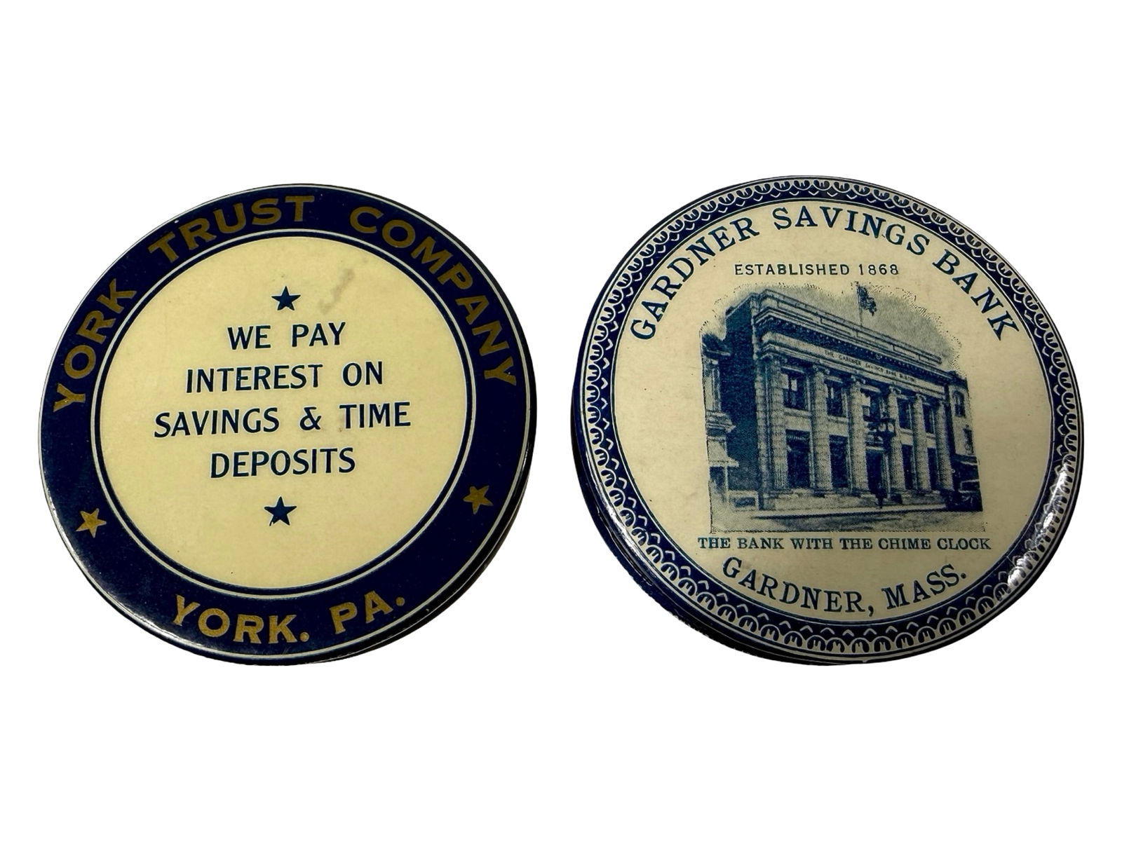 Two Celluloid Pocket Dime Banks: York Trust Company / Gardner Savings Bank - American 1920/30's - 2 1/2" Diameter