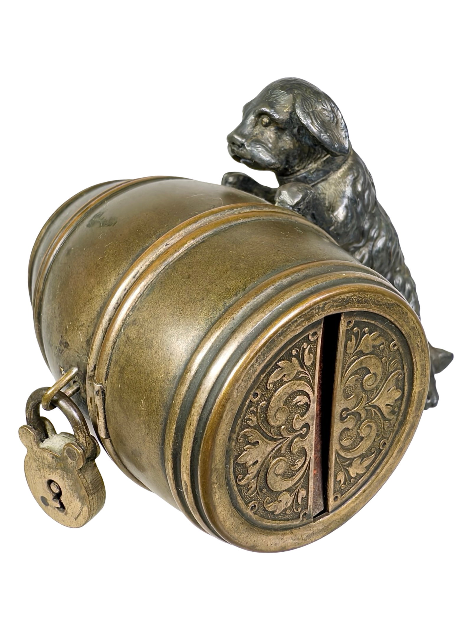 Dog Pushing a Long Barrel Bank: Made of Silvered Lead and Tin. Germany - Circa Early 1910's. 2 1/2" Tall x 3" Wide x 3 1/4" Deep.