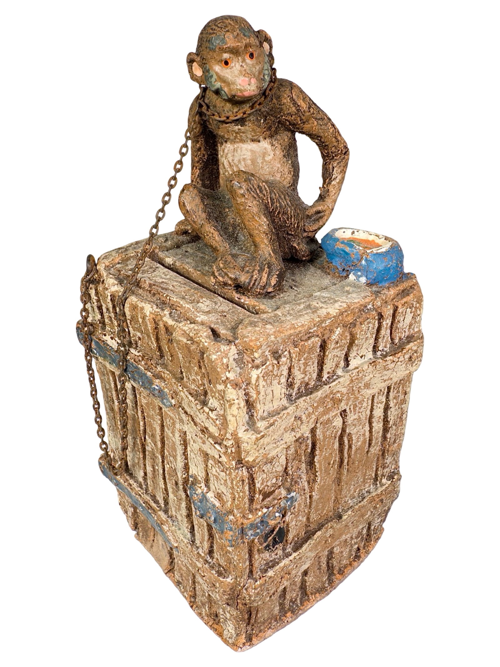 Monkey on Crate Still Bank: By Hausser Company for Elastolin. Germany - Circa 1930's. 4 3/4" Tall x 2 1/4" Wide x 2" Deep. Bob and Shirley Peirce Collection.