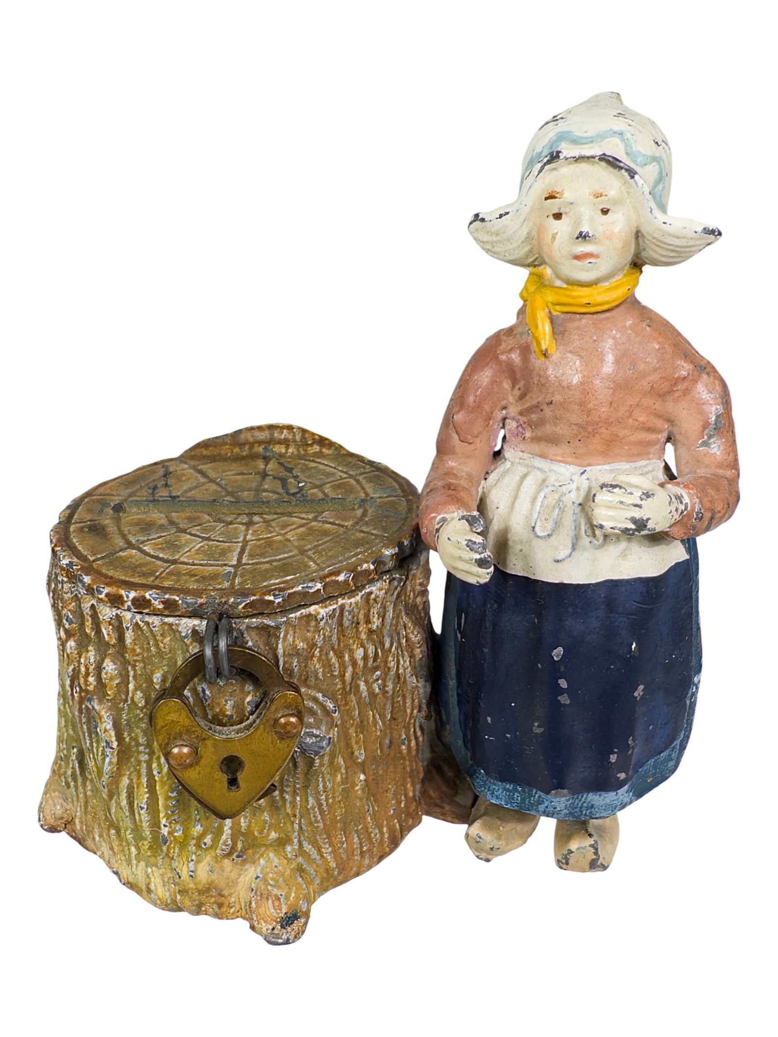 Dutch Girl Beside Tree Stump: Very Rare Unrecorded Example. Germany - 1910's. 3 1/4" Tall x 3" Wide x 2 1/4" Deep. Bob and Shirley Peirce Collection.