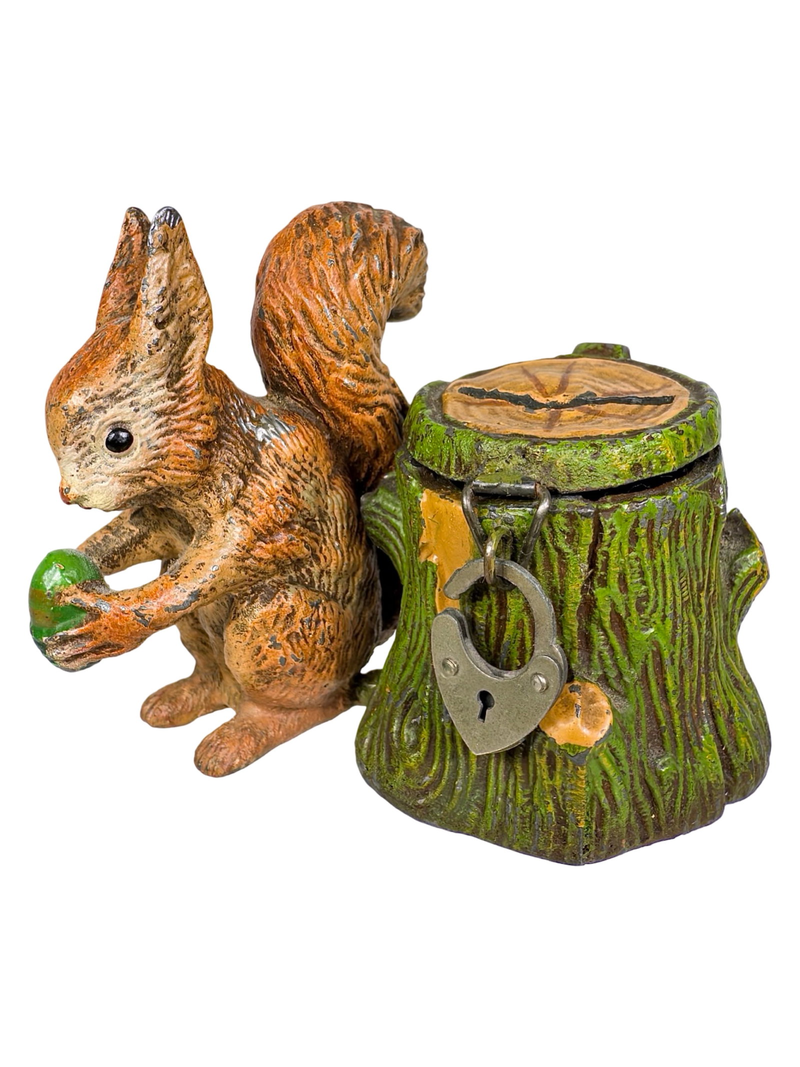 Squirrel Eating a Nut Beside a Tree Stump Spelter Bank: Germany - Mid 1920's. 2 1/2" T x 3 1/4" W x 2 1/2" D. Bob and Shirley Peirce Collection,
