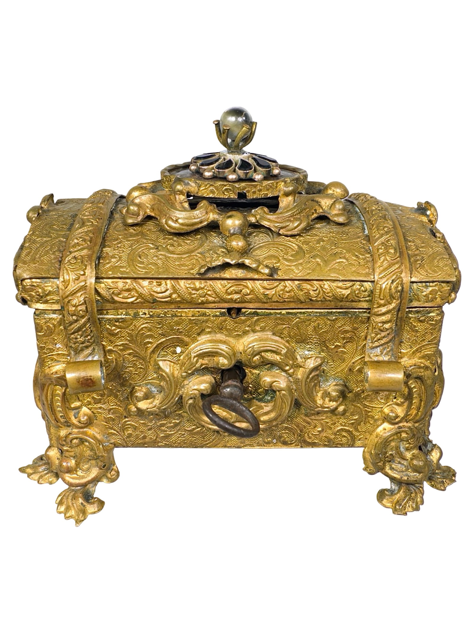 Ornate Gilt Casket Still Bank: Vienna - 1880's - 3 1/4" T x 4" L. Bob and Shirley Peirce Collection. One must lift the central jeweled element to reveal the placement of the coin slot.