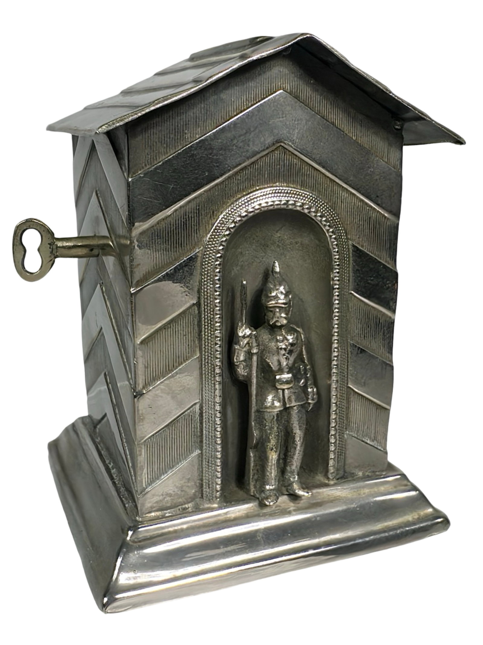 Standing Guard in the Sentry House Still Bank: Very Handsome Silver Plate Bank. European - 1910 - 3 3/8" T x 2 1/2" L. Bob and Shirley Peirce Collection.