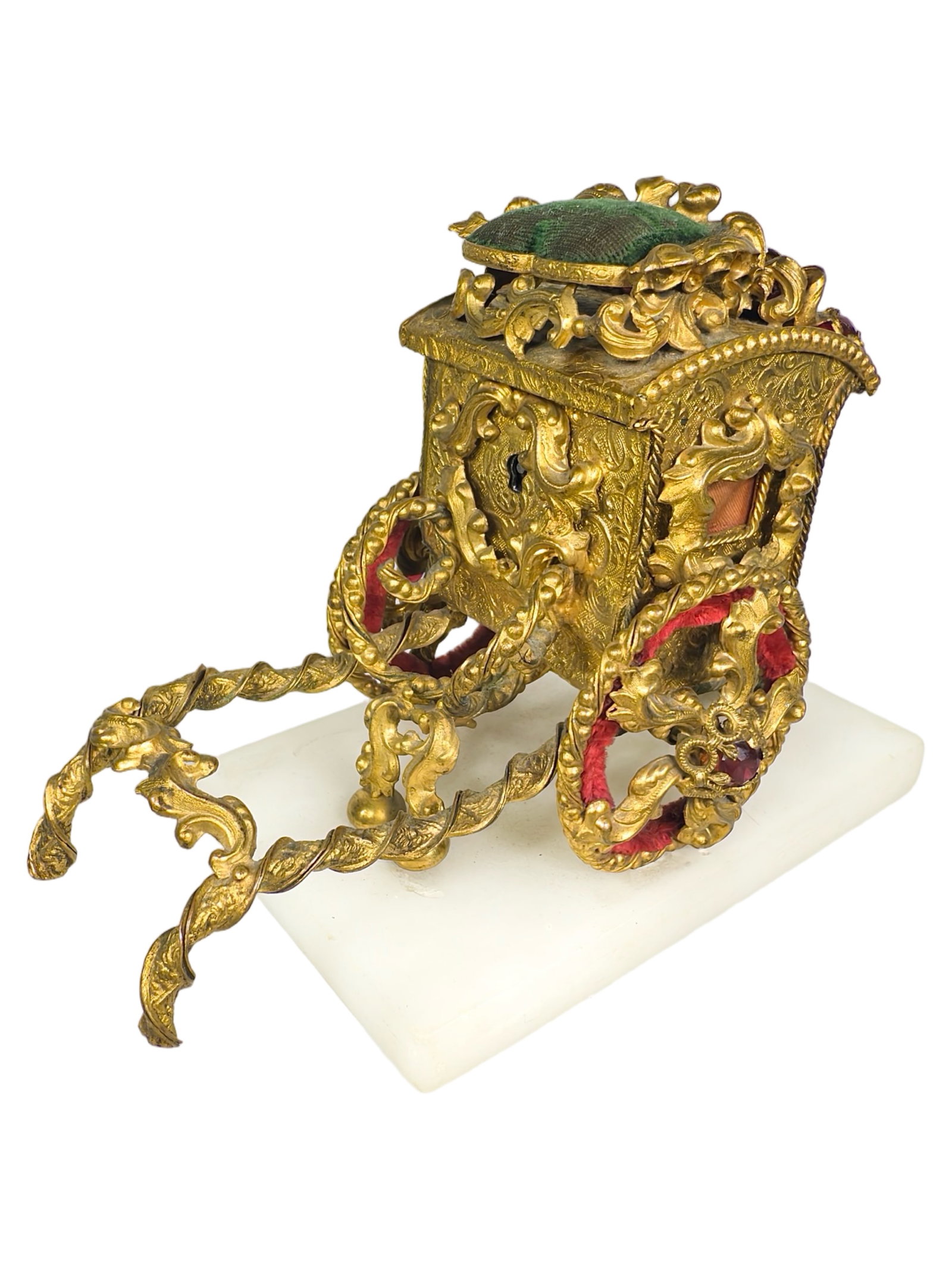 Ornate Gilt Sedan Chair with Curtains Still Bank: Mounted on a White Alabaster Base. Vienna - 1880's - 4 1/2" T x 6 1/4" L. Bob and Shirley Peirce Collection.