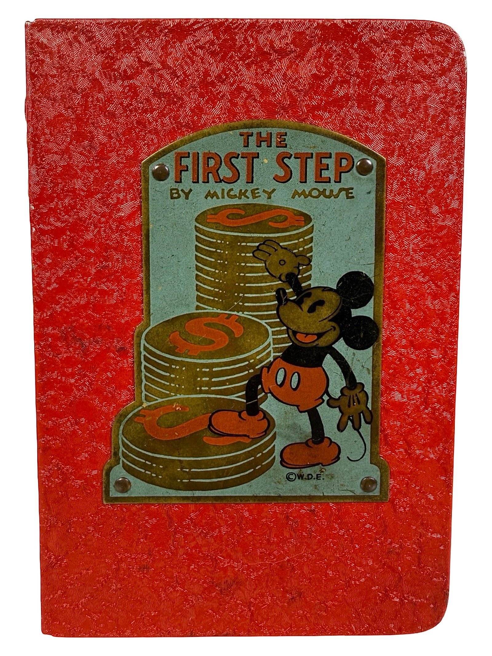 The First Step Still Bank: By Mickey Mouse. Made by Automatic Recording Safe Co. Chicago, IL - Late 1930's. 4 3/4" Tall x 3 1/4" Wide. Bob and Shirley Peirce Collection.