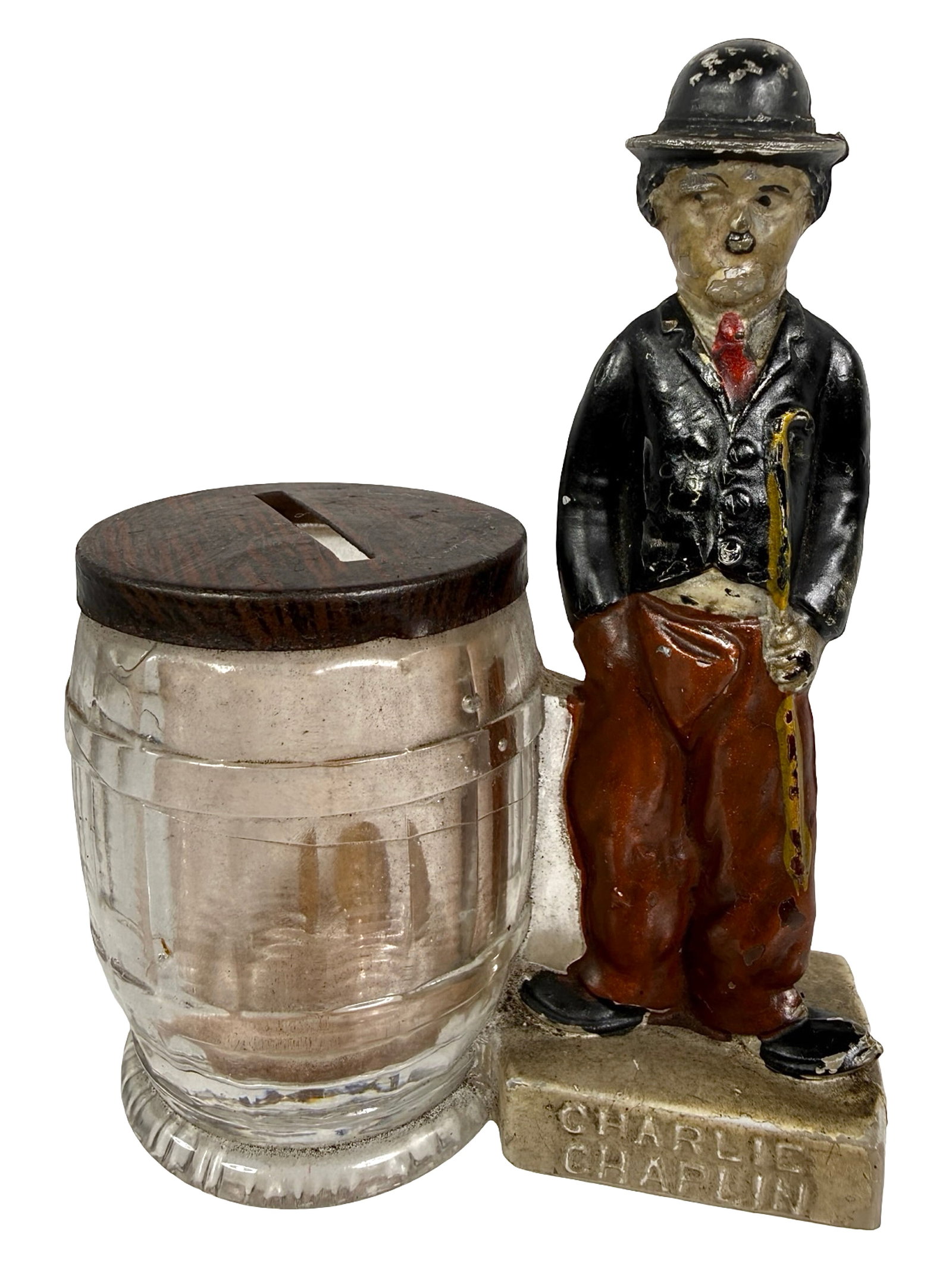 Charlie Chaplin by Curved Barrel: First used as a Candy Container. Made by Geo. Borgfeldt & Company. New York - 1915 - 3 5/8" T x 3 3/8" W. Bob and Shirley Peirce Collection.New York - 1920 - 3 3/4" T x 3" W. Bob and Shirley Peirce Co