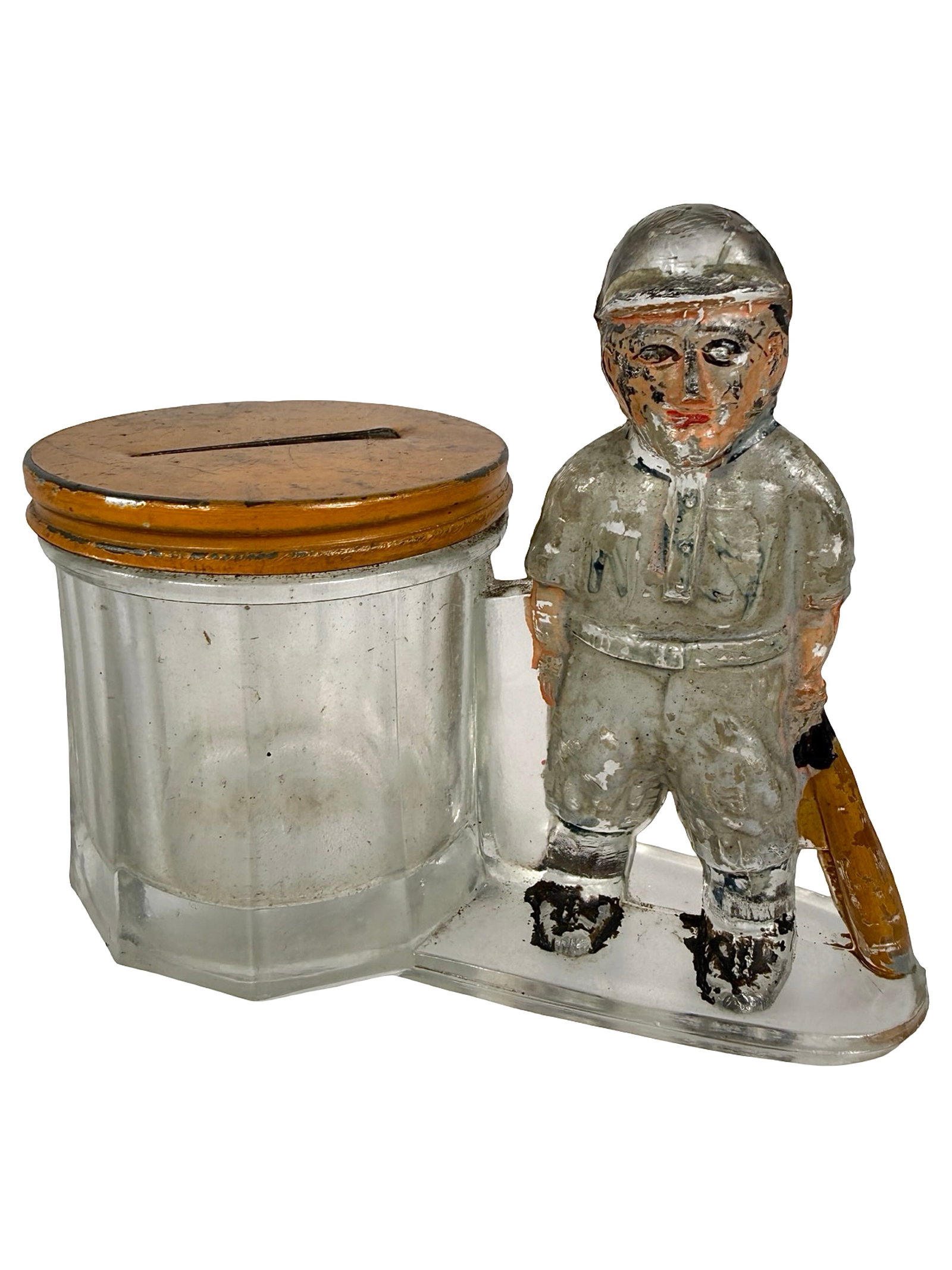 Baseball Player by Barrel Bank: First used as a Candy Container. USA - Ca. 1920 - 3 1/4" T x 4" L. Bob and Shirley Peirce Collection.
