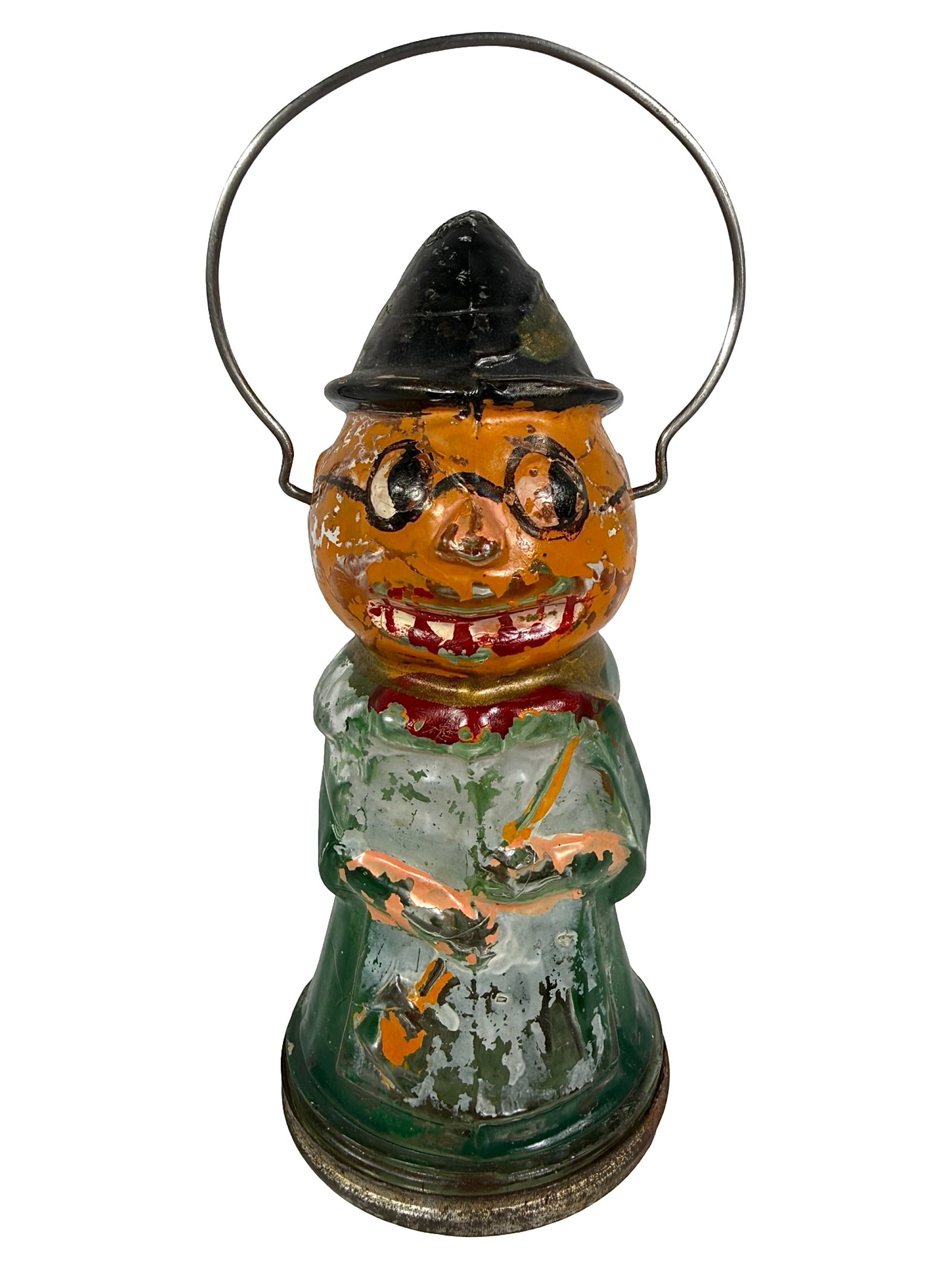 Pumpkin Headed Witch - Green Dress - Exceedingly Rare Candy Container: USA -1920 - 4 3/8" T x 2" D at base. Bob and Shirley Peirce Collection. This whimsical pumpkin head glass candy container illustrates many of the classic attributes of the witch's uniform. Included ar