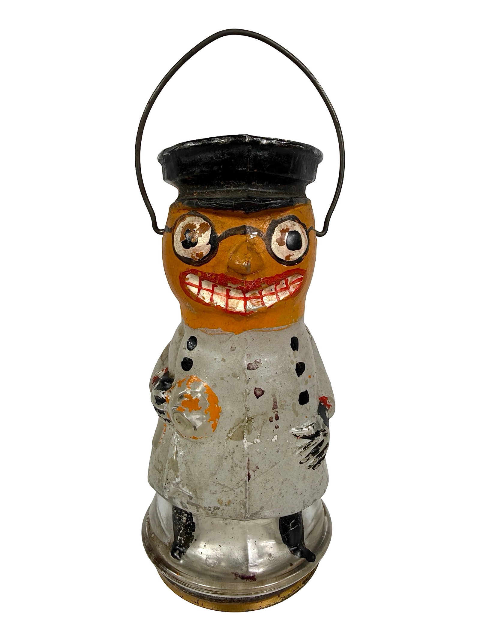 Pumpkin Headed Chauffeur Motorist - Rare and Important Candy Container: USA - 1915 - 4 3/4" T x 2 1/4" D at base. Bob and Shirley Peirce Collection. Dezso and the Poirier's misidentified this Halloween candy container as a policeman. When, in fact, he is wearing a costume