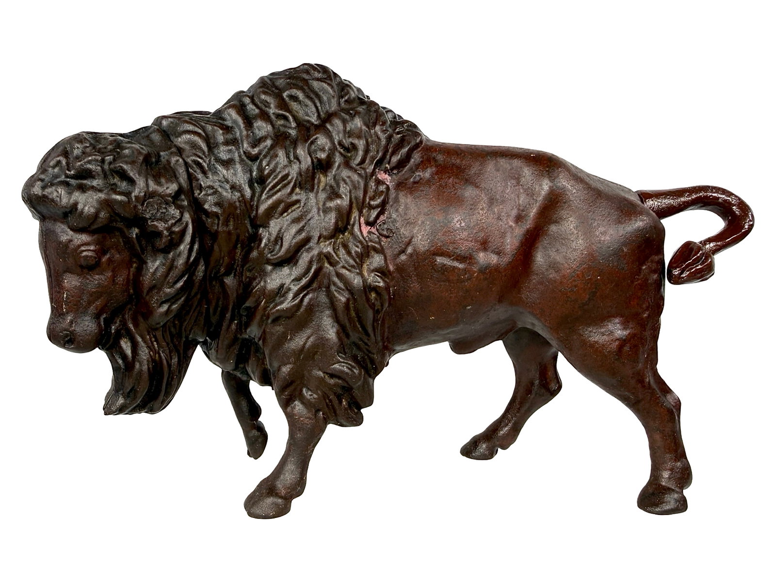 Buffalo with Twist Tail - Cast Iron Bank: Unknown American Maker. Circa 1930's - 5 3/4" T x 9" L. Bob & Shirley Peirce Collection. Most collectors consider this a semi-mechanical toy bank because of the complicated system of tail twists you m