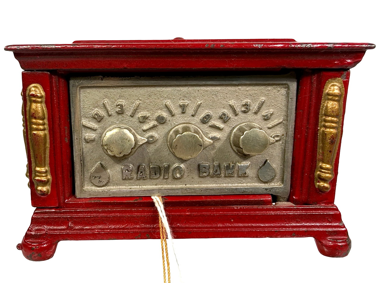 Small Red Three Dial Radio Bank: By the Kenton Hardware Company. Late 1920's - 3" Tall x 4 5/8" Wide. From the Andy Moore Collection. Bob & Shirley Peirce Collection.