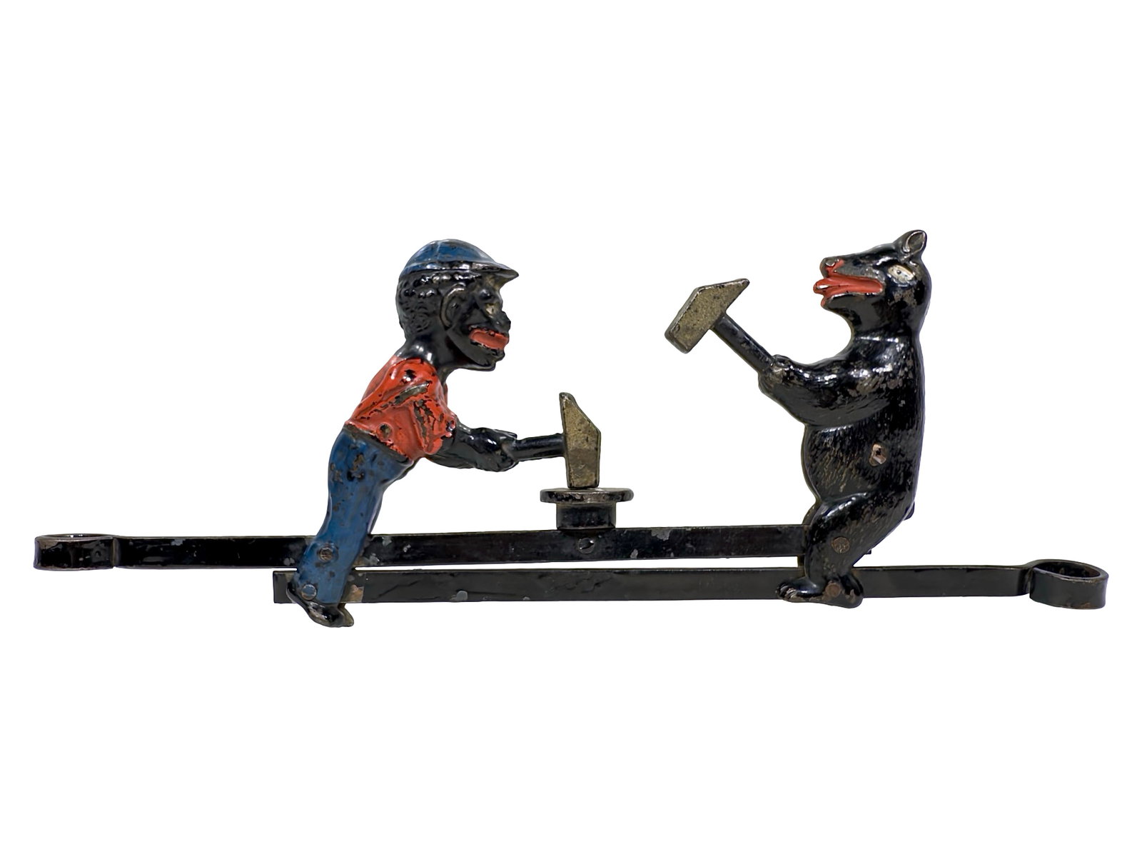Black Boy and Bear Cap Bomb: Made by the Ives, Blakeslee Company. Bridgeport - Ca. 1895 - 4 1/2" T x 13" Long. Caps placed on the small table/fulcrum between the two figures are exploded when the finger pulls are pulled. This is 