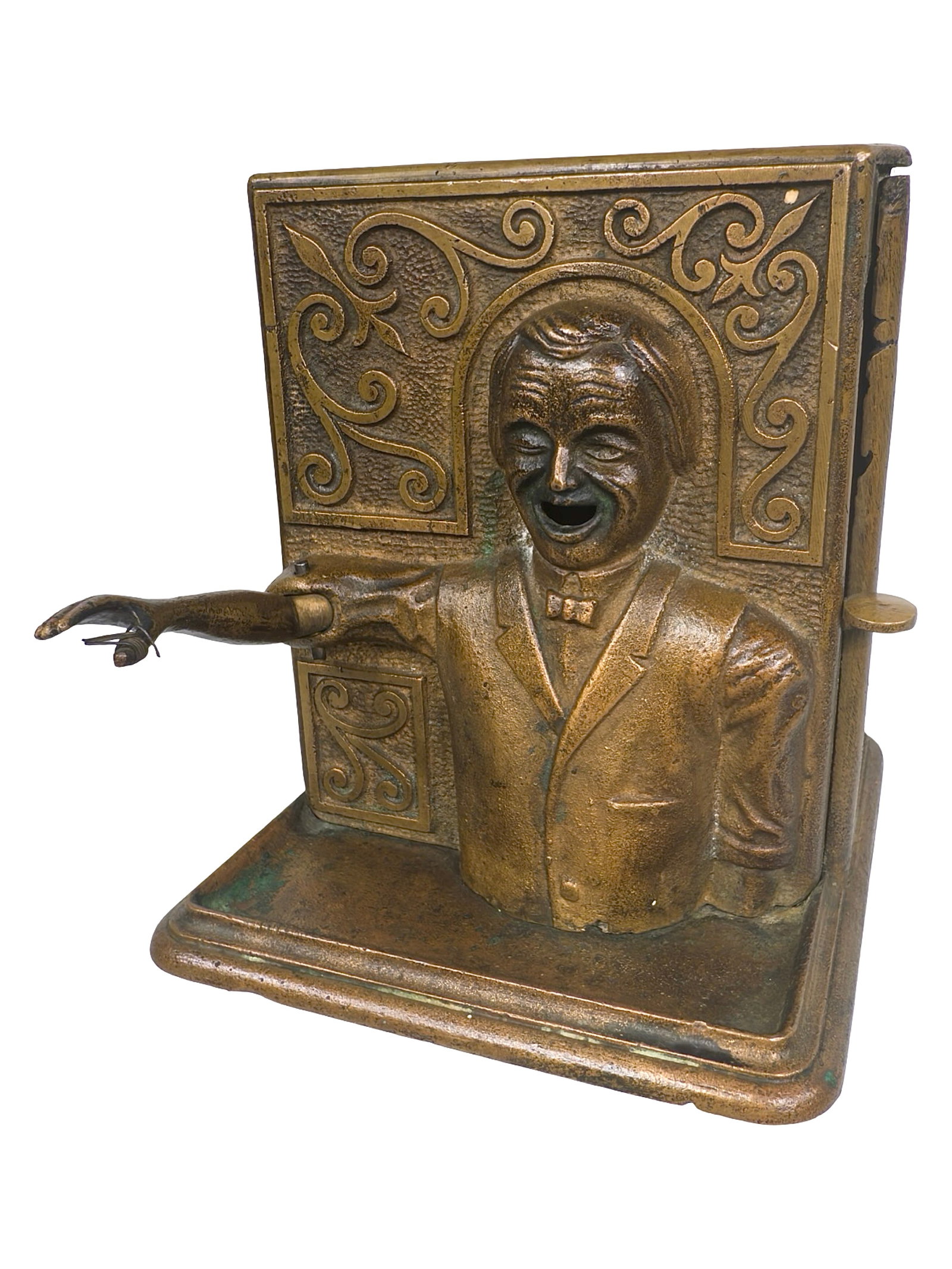 Cigarette Dispenser: American - 1870's. 5 1/2" Tall x 5" Wide x 5 1/4" Deep. We believe this to be an image of a young Boss Tweed and politically inspired.