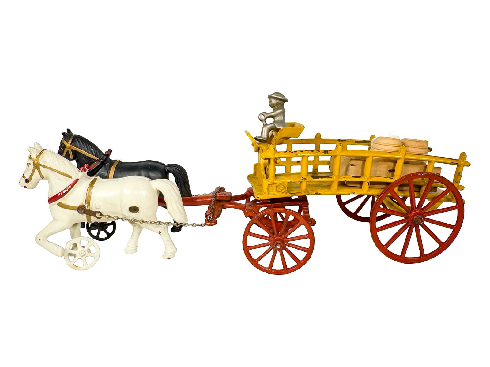 Two Horse Stake-Sided Dray - Cast Iron Toy: By the Dent Hardware Company. Fullerton, Pa. - Early 1900's. 15 3/4" Long x 6 1/2" Tall. The John & Kira Olshefski Collection. Dent uses an appropriate pair of workhorses to bring a greater measure of