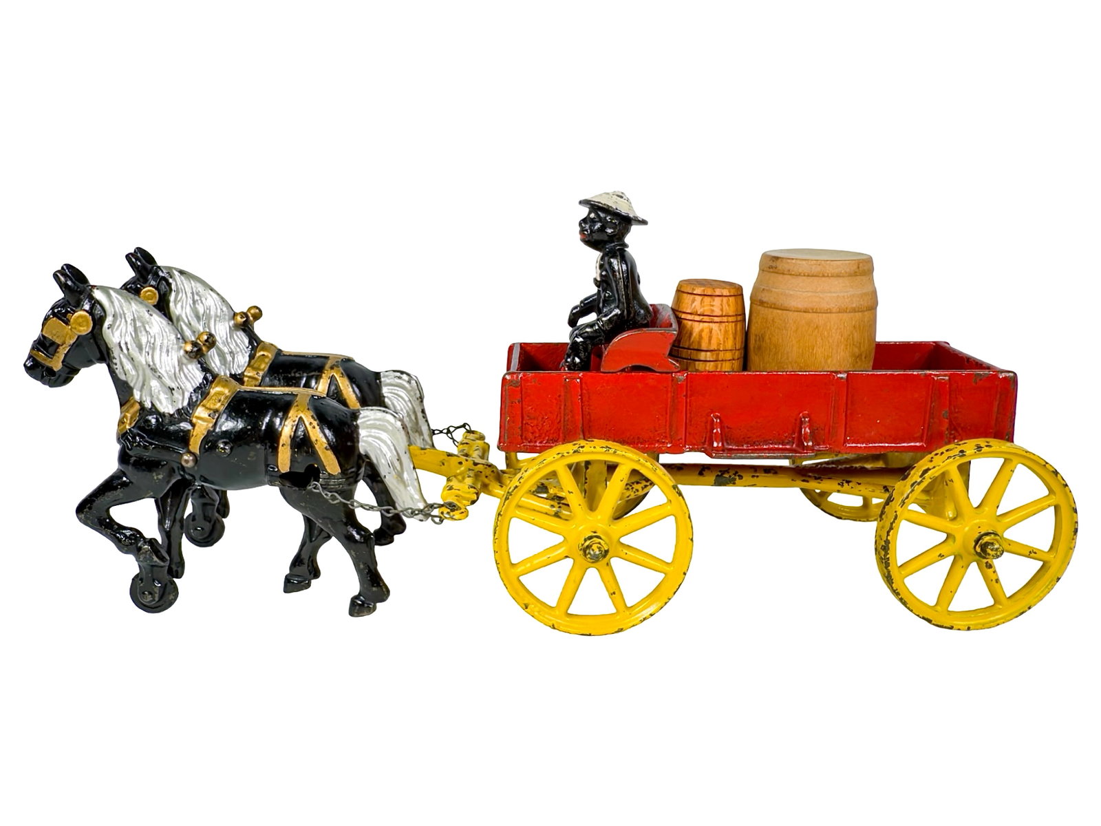 Red Plantation Dray Wagon - Cast Iron Toy: By the Kenton Hardware Company. Kenton, Ohio - Circa 1910's. 15 1/4" Long x 6 1/2" Tall. The John & Kira Olshefski Collection. The black workhorses are characterized with silver/gray manes and tails. 