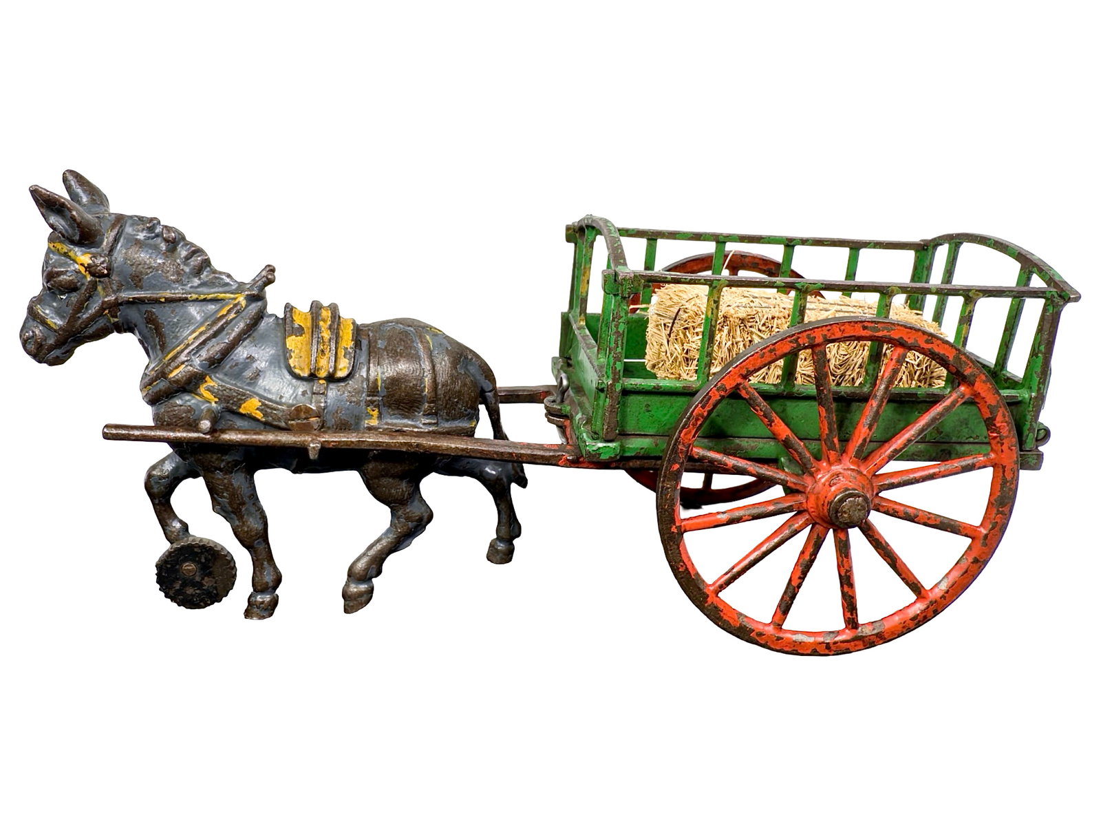 Donkey Drawn Hay Wagon - Cast Iron Toy: By the Welker & Crosby Company. Brooklyn, NY - Circa Mid 1880's. 10 1/2" Long x 5 1/2" Tall. The John & Kira Olshefski Collection. Known for their thin and fragile castings means that Welker & Crosby'