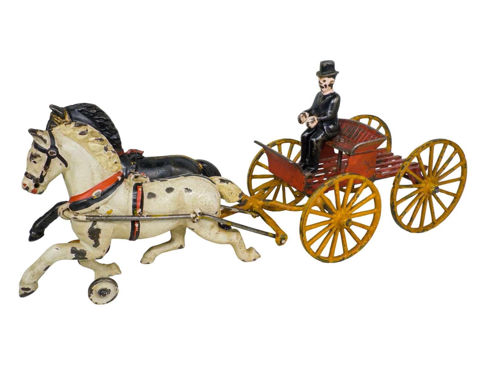 Rare Two Horse Buckboard - Cast Iron Toy: By the Harris Toy Company. Toledo, Ohio - Circa 1890's. 14 1/2" Long x 6 1/4" Tall. The John & Kira Olshefski Collection. The buckboard is a four-wheeled wagon of simple construction. The buckboard ha