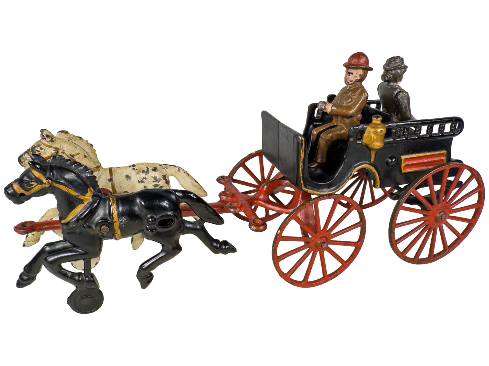 Two Horse Back-to-Back Trap - Cast Iron Toy: By the Hubley Mfg. Company. Lancaster, Pa. - Circa 1900. 13 1/2" Long x 6 1/4" Tall. The John & Kira Olshefski Collection. This is a beautiful fancy carriage toy. In the day, this type of coach was al