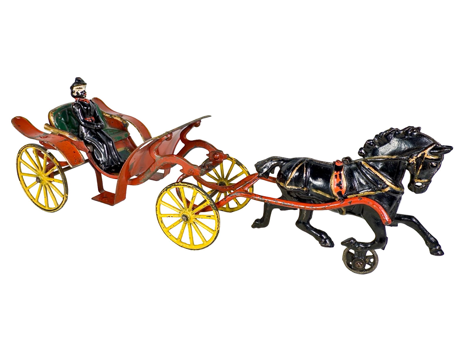 Bright Red Phaeton - Cast Iron Toy: By Wilkins Hardware Company. Keene, NH - Circa Early 1900's. 15 1/2" Long x 5 3/4" Tall. The John & Kira Olshefski Collection. A phaeton features a minimal very lightly sprung body atop four extravaga