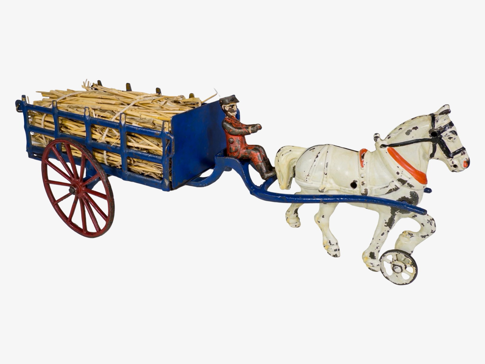 Elongated Flatbed Stake Cart - Cast Iron Toy: By the Harris Toy Company. Toledo, Ohio - Late 1890's. 15 1/4" Long x 5 1/8" Tall. The John & Kira Olshefski Collection. Such horse drawn vehicles were most typically employed for use on the farm. Ind