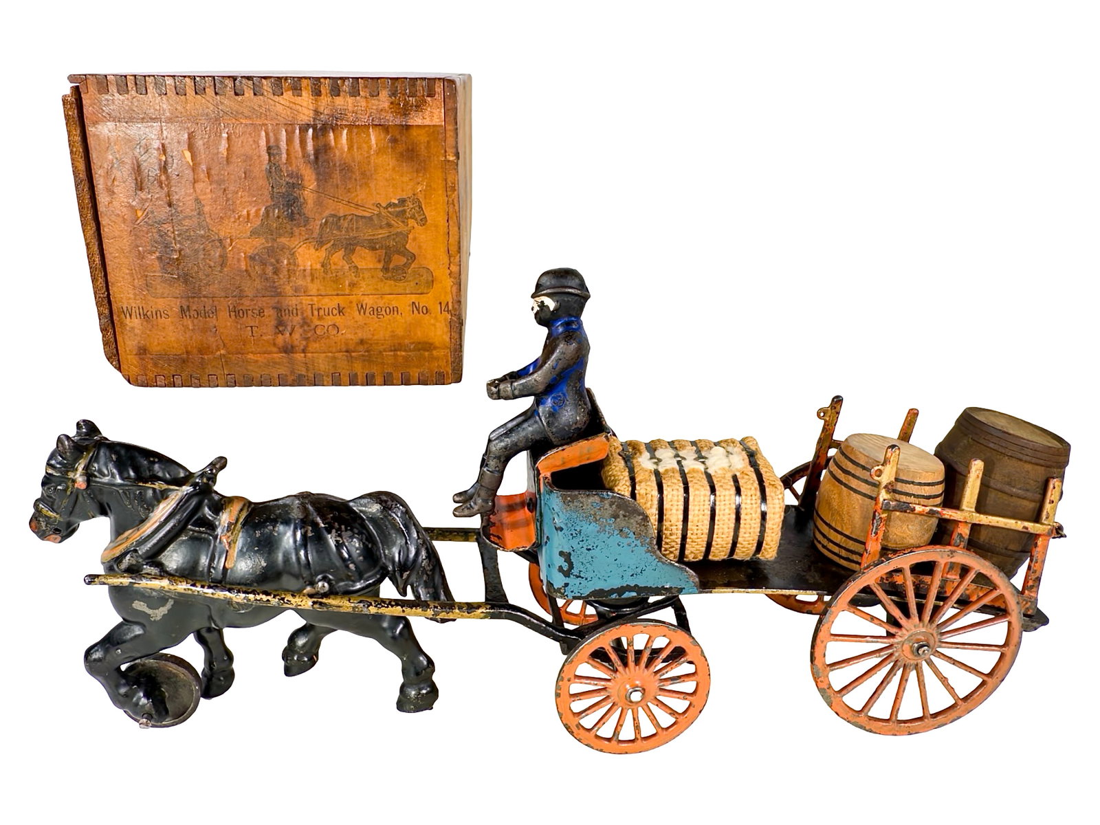 Unusual Early One Horse Dray - Cast Iron Toy: By the Wilkins Hardware Company. Keene, NH - Circa Mid 1890's. From the Bob Stewart Collection. Measures 15" Long x 7 1/4" Tall. The John & Kira Olshefski Collection. This handsome dray represents ext