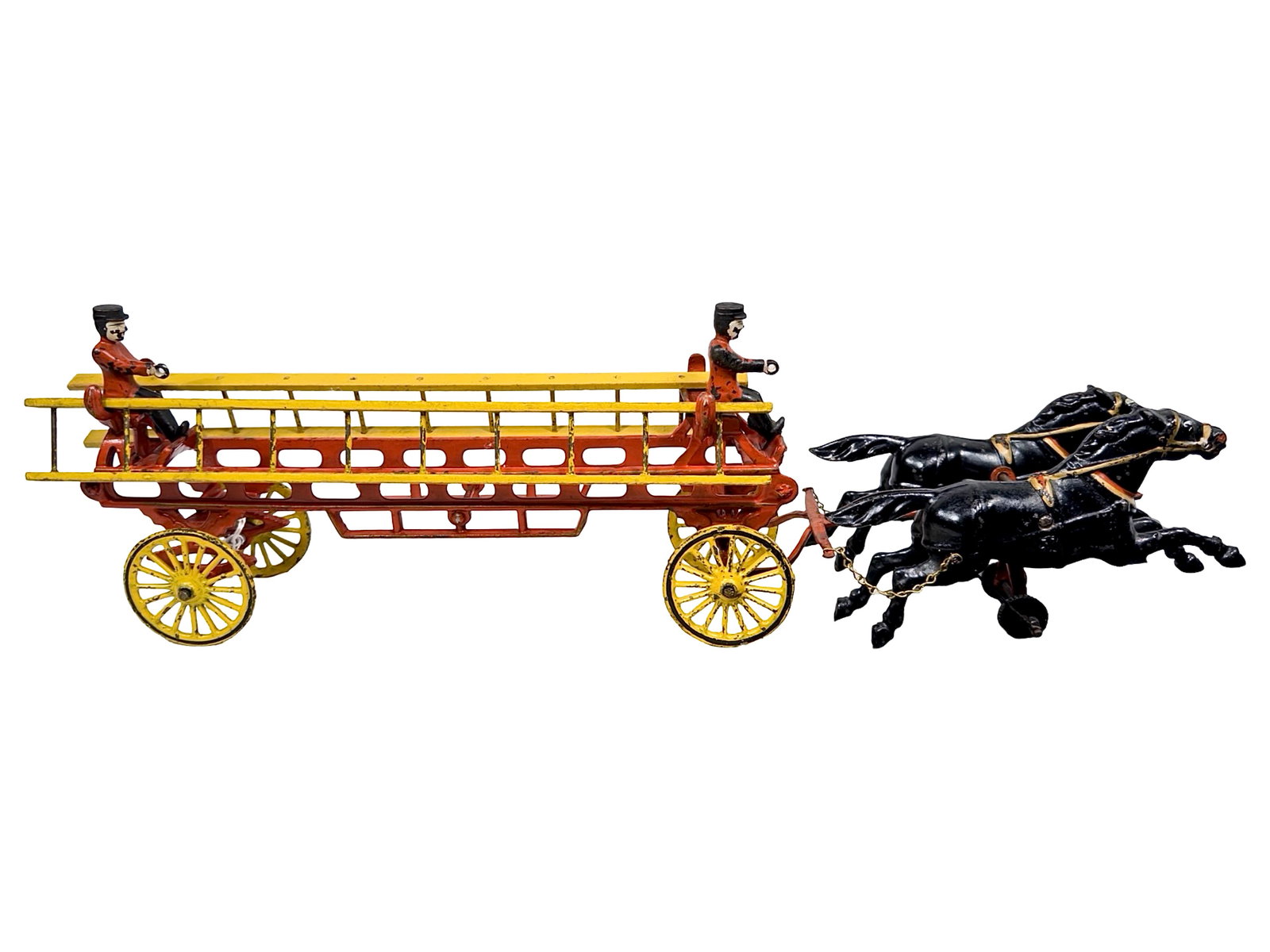 Medium Scaled Hook & Ladder - Cast Iron Toy: By the Wilkins Hardware Company. Keene, NH - Circa Late 1890's. 20 1/2" Long x 7 1/4" Tall. The John & Kira Olshefski Collection. This is a very good-looking fire toy. It sports a bright red body and 