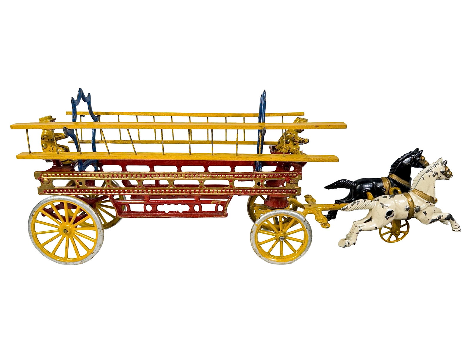 Hook and Ladder Apparatus - Cast Iron Toy: By the Hubley Mfg. Company. Lancaster, Pa. - Circa 1910's. 21 1/4" Long x 8 1/2" Tall. The John & Kira Olshefski Collection.