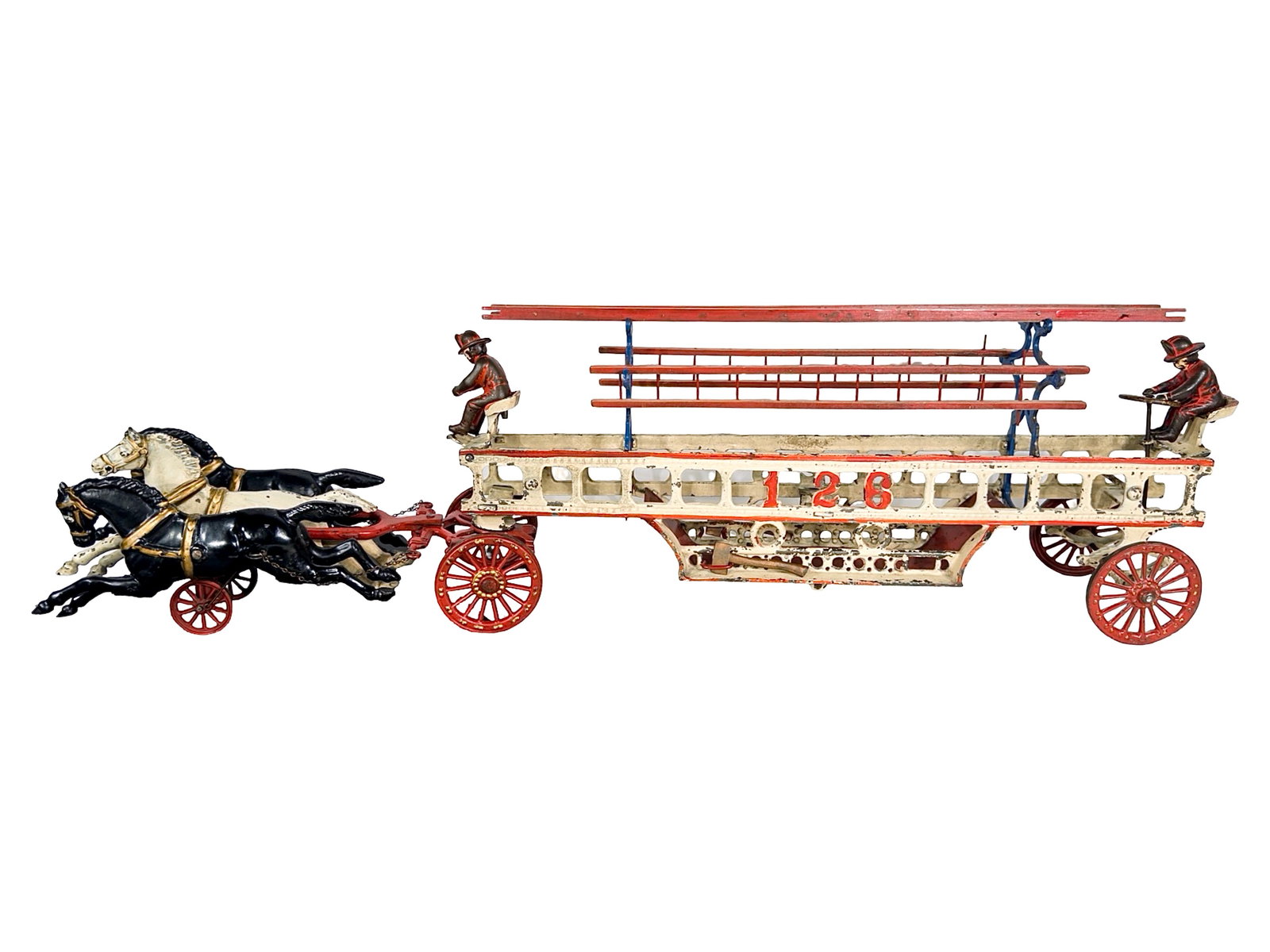 Scarce "126" Hook and Ladder - Cast Iron Toy: By the Hubley Mfg. Company. Lancaster, Pa. - Circa 1910's. 32 1/2" Long x 9 1/4" Tall. The John & Kira Olshefski Collection.
