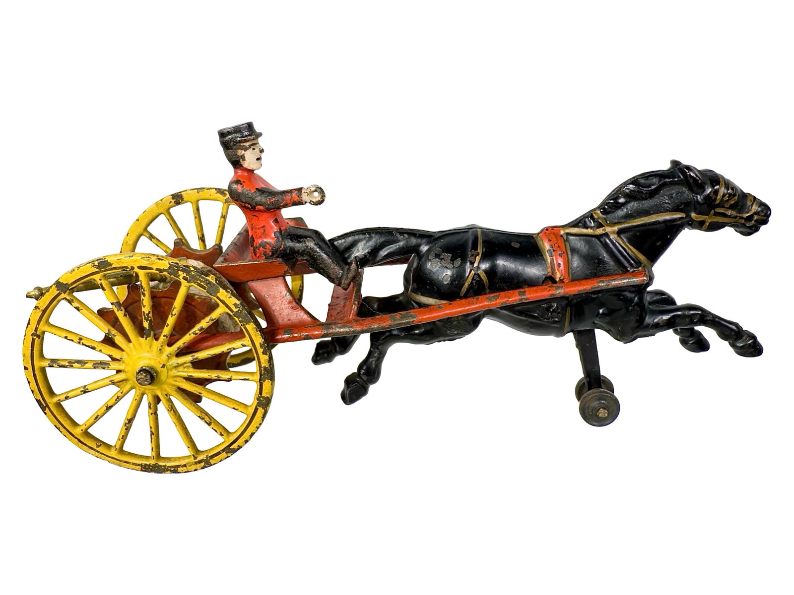 Small One Horse Hose Reel - Cast Iron Toy: By Wilkins Hardware Company. Keene, NH - Circa Late 1890's. 10 1/2" Long x 5 1/8" Tall. The John & Kira Olshefski Collection. Wilkins fire toy products are almost always finished in bold hues of red, 