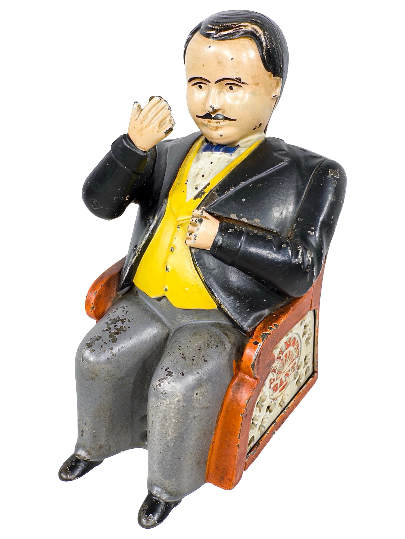 Tammany Bank - Boss Tweed - Mechanical Bank: Black Jacket & Light Gray Pants. By the J. & E. Stevens Company. Cromwell, Ct. - Circa Mid 1880's. In this toy bank, we find a disturbing image of a politician whose body has been fattened by his insa