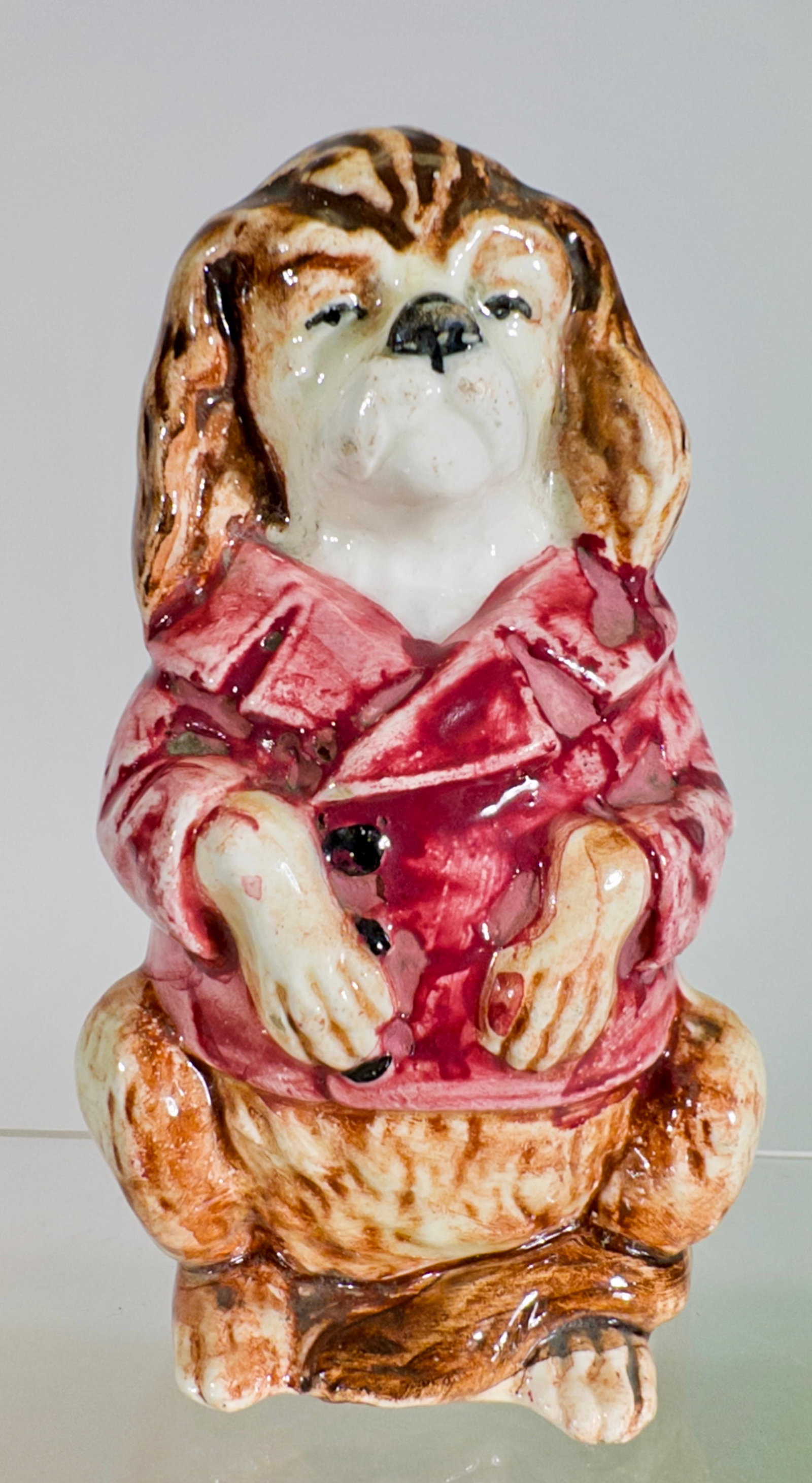 Porcelain Dressed Dog - Still Bank: Austrian 1920's. 4 1/2" Tall x 2 1/2" Wide. Tom Kellogg Collection.