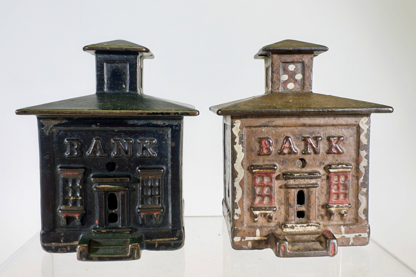 Two Small Cupola - Cast Iron Banks: J & E Stevens Company. Cromwell, CT. 1870's. 3 1/4" Tall x 2 1/2" Wide. Tom Kellogg Collection.