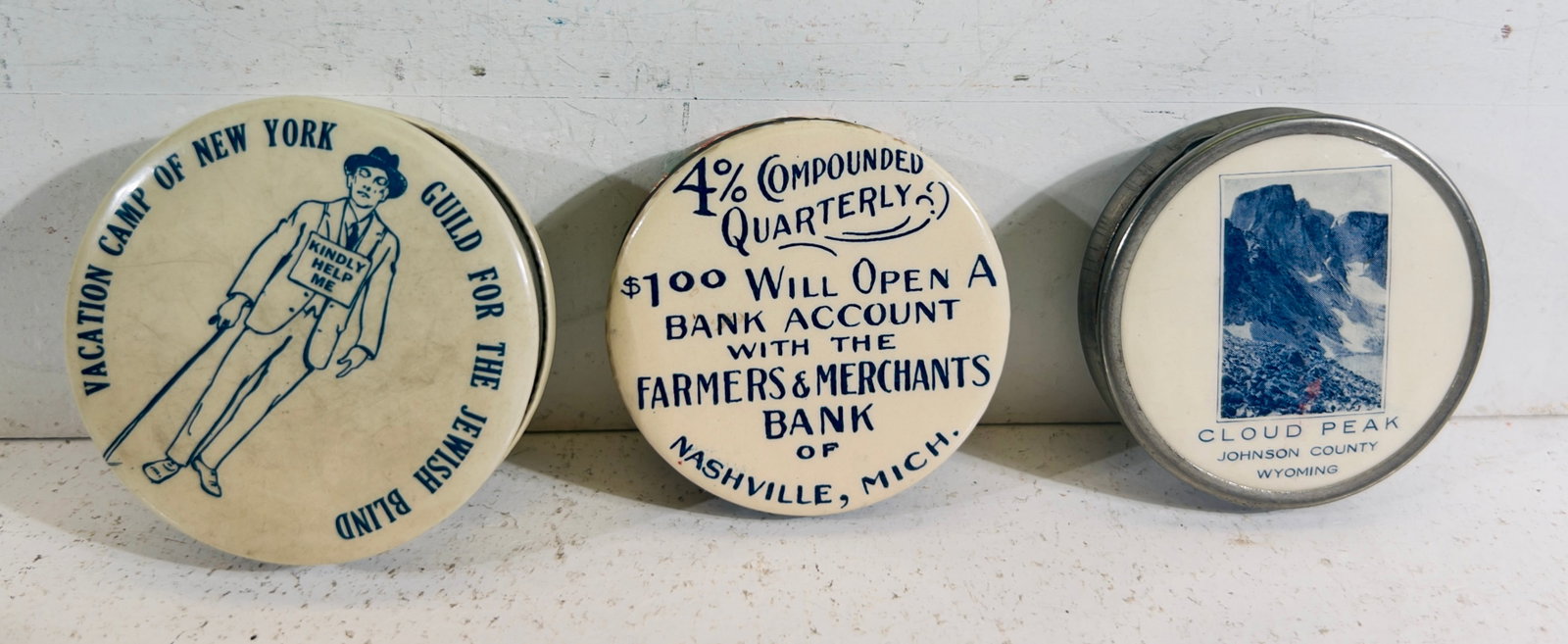 Three Midsize Celluloid Dime Banks: American 1920/30's. 2" Circular. Tom Kellogg Collection.