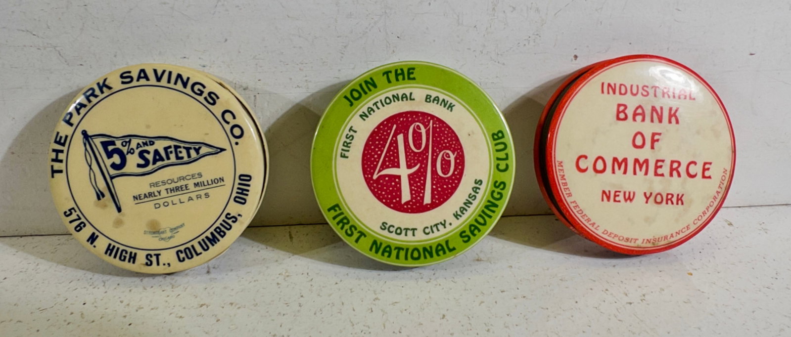 Three Celluloid Dime Banks (1 of 2)