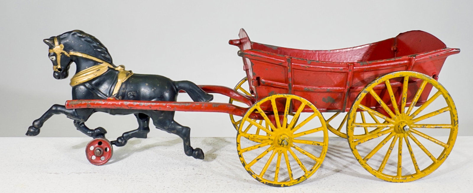 Conestoga Type Farm Wagon - Cast Iron Toy: Hubley Mfg. Company. Lancaster, PA. - 1910's. 5" Tall x 15" Long. The Olshefski Collection.