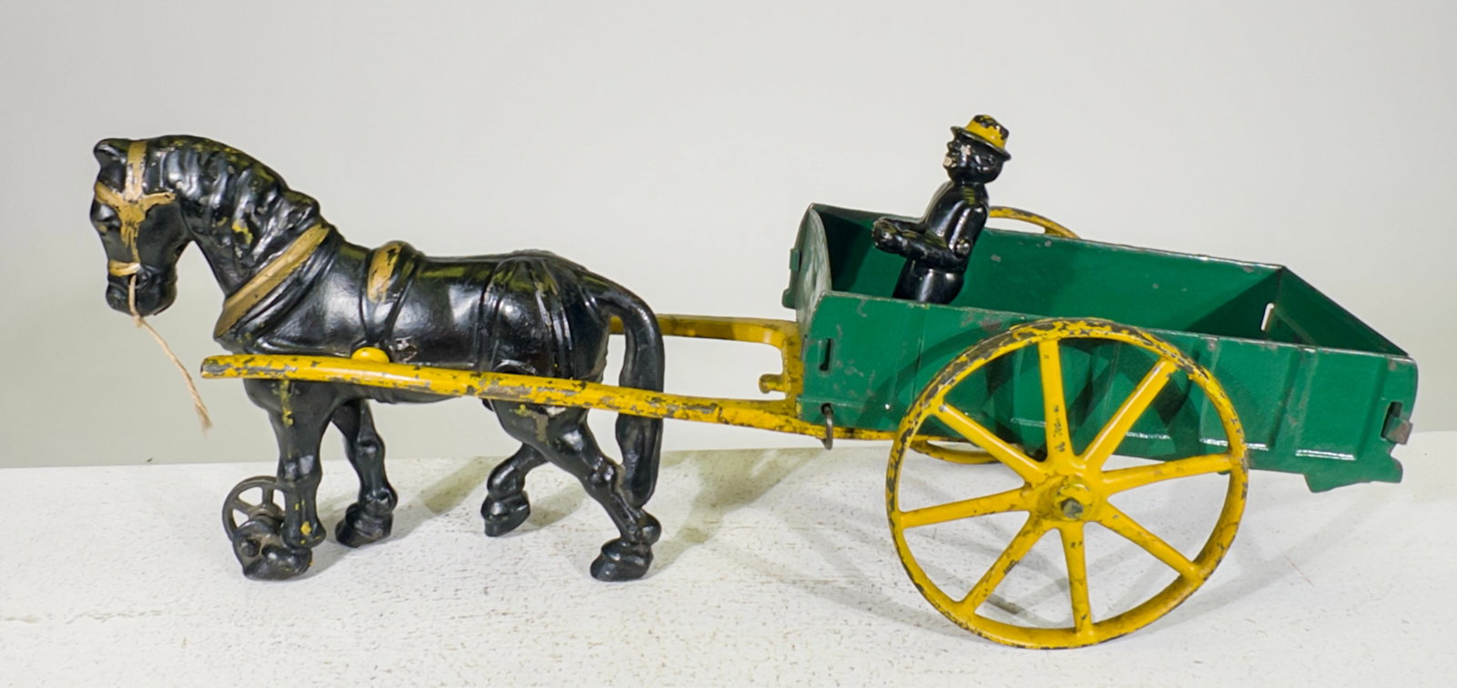 Single Horse Dray Wagon - Cast Iron Toy: Hubley Mfg. Company. Lancaster, PA. - 1910's. 5" Tall x 13" Long. The Olshefski Collection.
