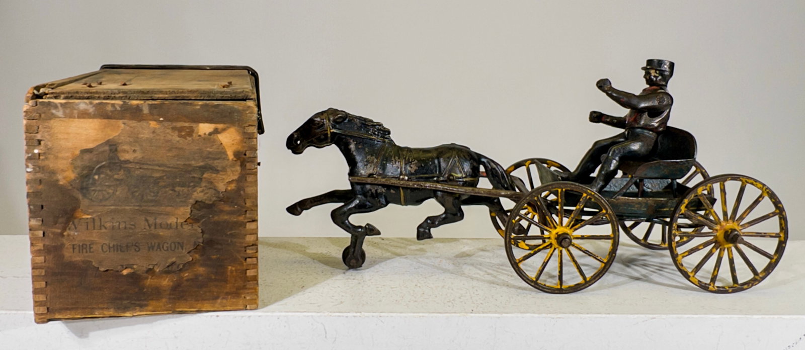 Fire Chief with Original Box Bottom - Cast Iron Toy (1 of 2)