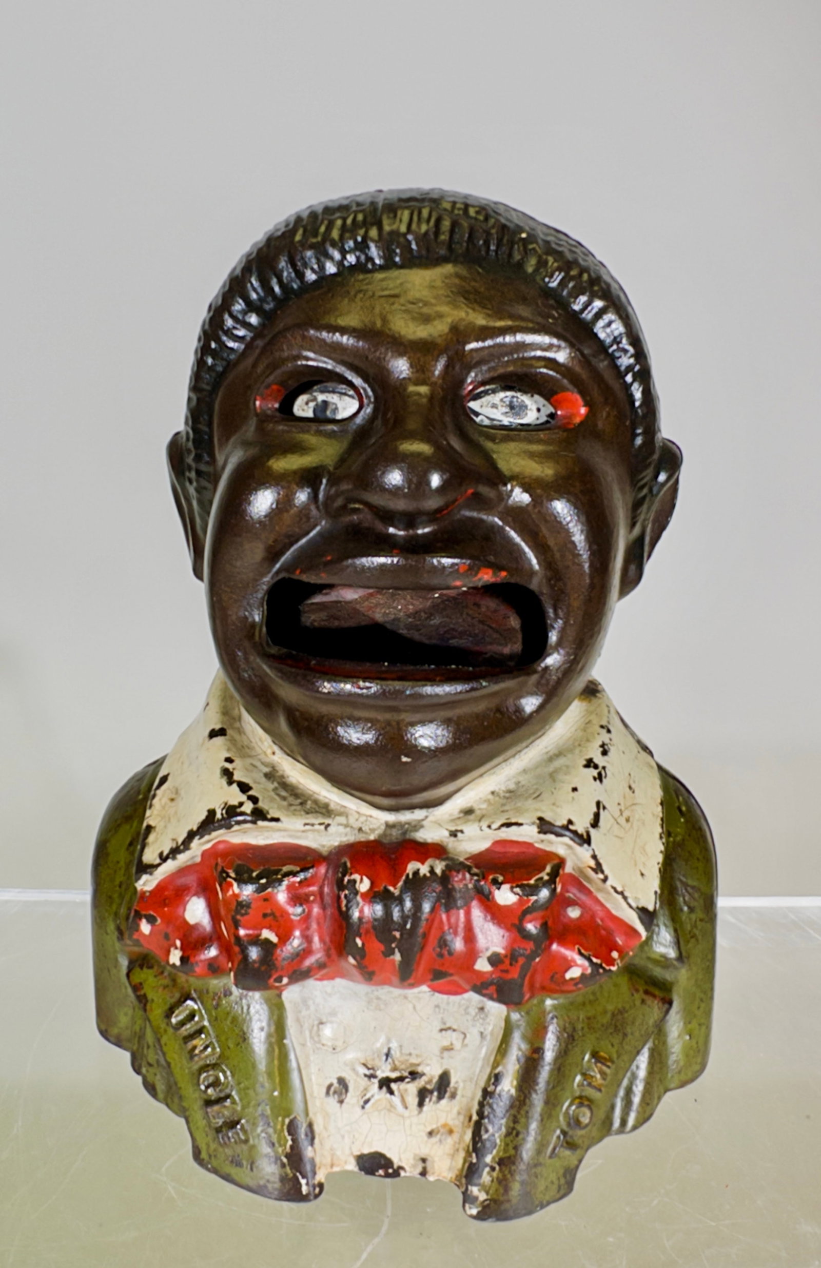 Uncle Tom Bank - Green Coat with Lapels and Star: Kyser and Rex Company - Philadelphia 1890 - 5 1/2"T x 4"W