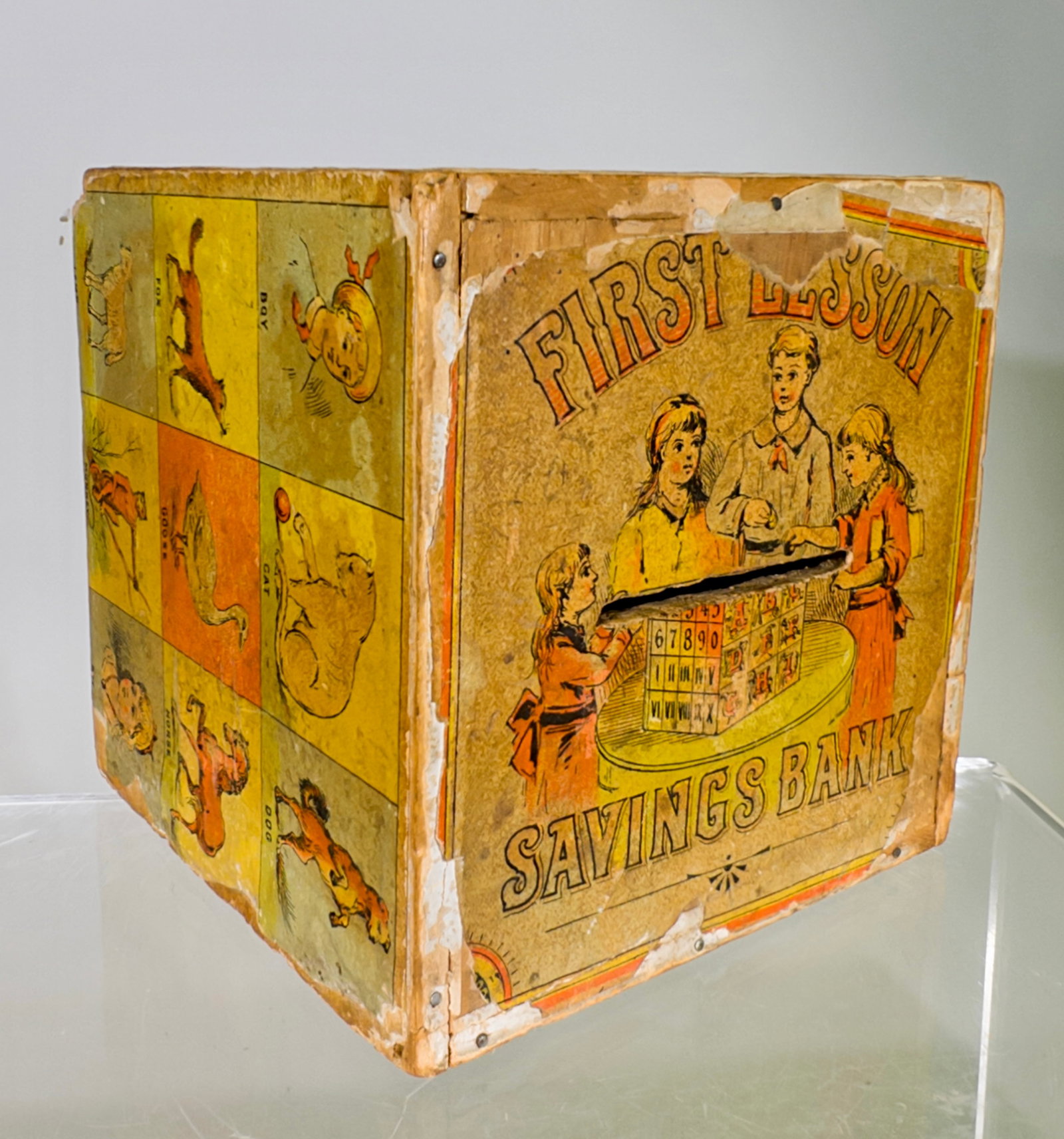 First Lesson Savings Bank - Paper Litho on Wood: American 1890 - 4 3/4"Cubed