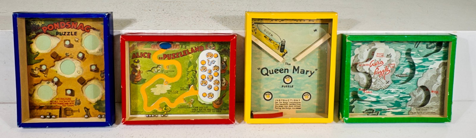 Four Dexterity Puzzles: Made by R. Journet - London 1930 to 1950's - 4"T x 5"W