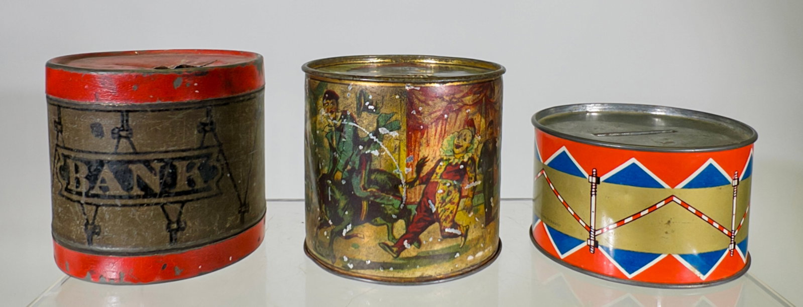 Three Tin Drum Shaped Banks (1 of 2)