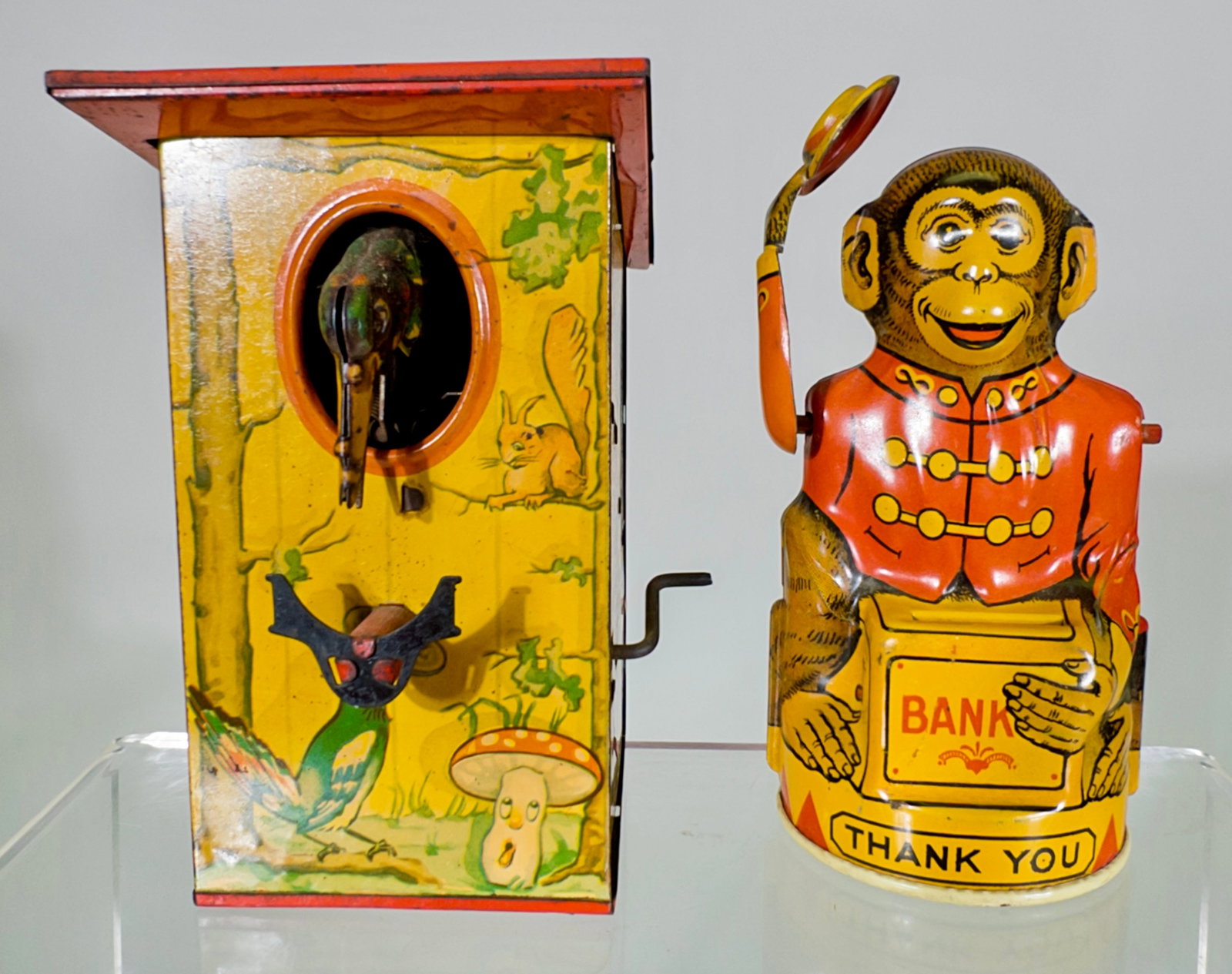 Two Tin Mechanical Banks: West German / American 1950/1930 - Pecking Bird is 5"T x 4"D x 3 1/8"W
