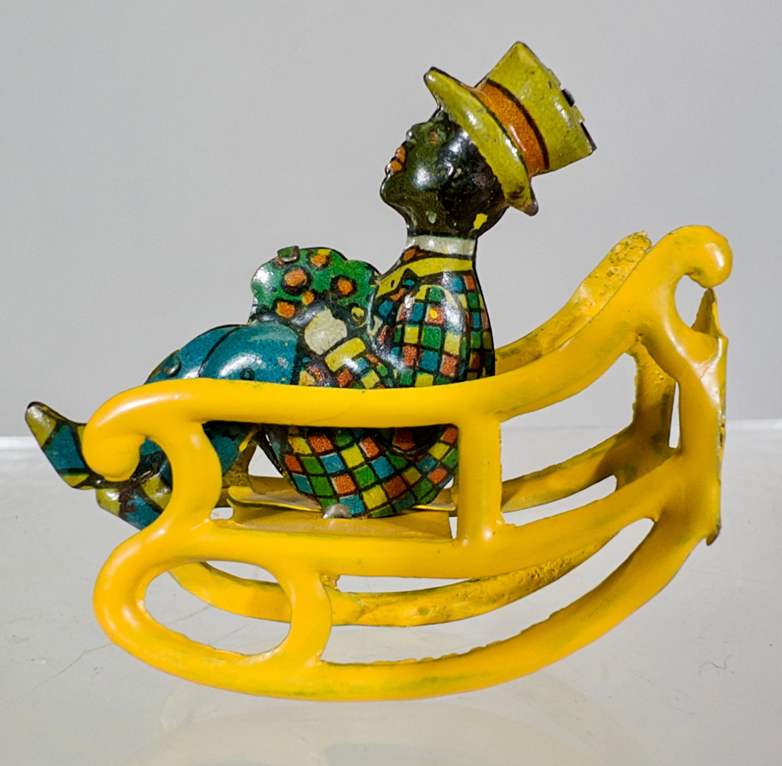 Young Black Man Rocking Penny Toy - Scarce (1 of 2)