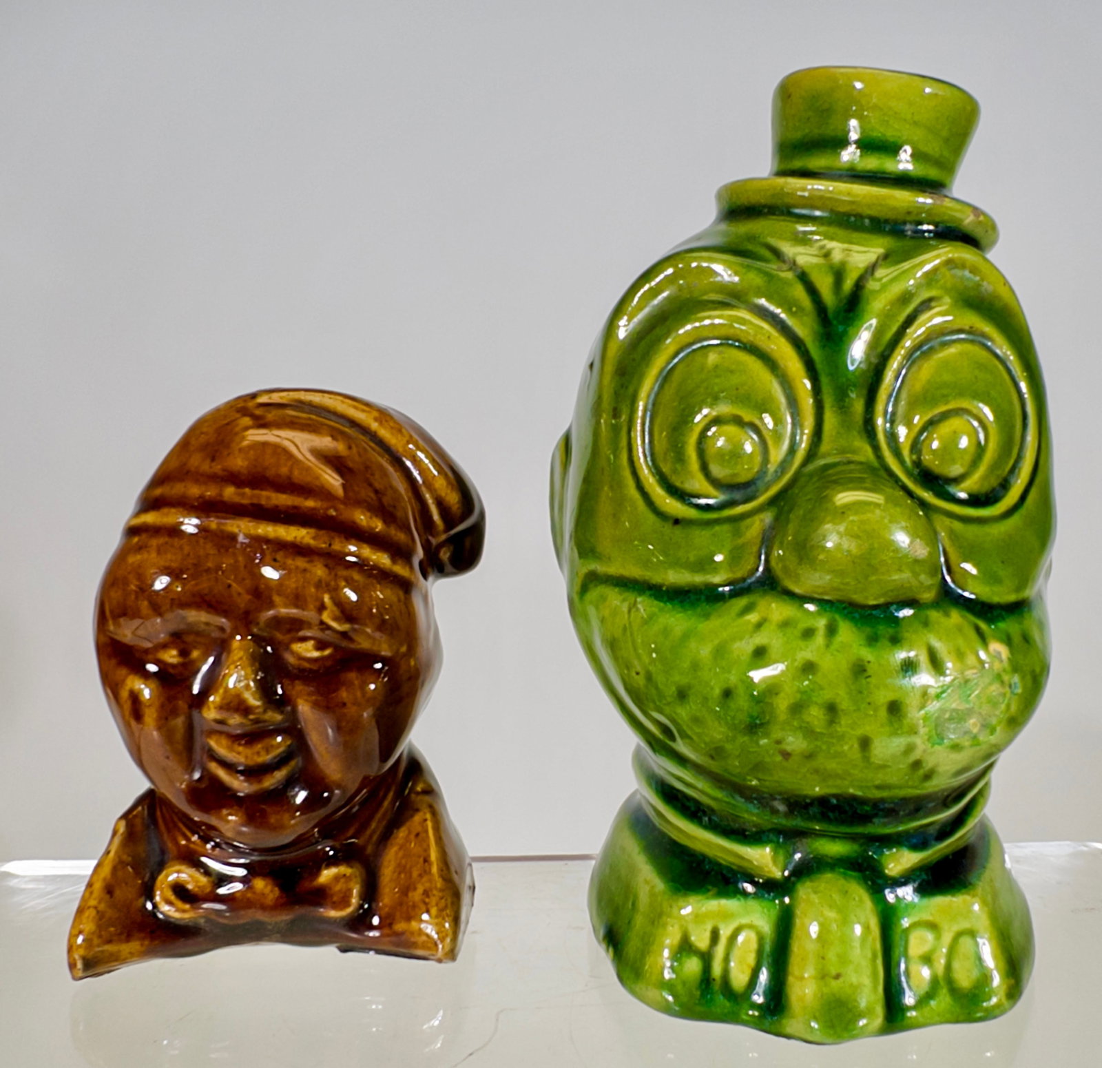 Two Ceramic Banks - Hobo / Man with Night Cap: American 1920/30's - Taller is 5 1/2"T x 4 1/2"D