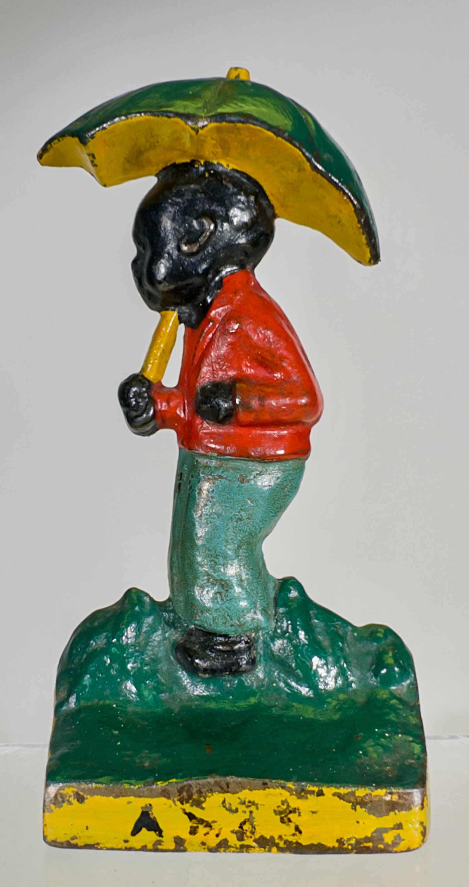 Boy Under Umbrella Cast Iron Doorstop - Very Scarce (1 of 2)