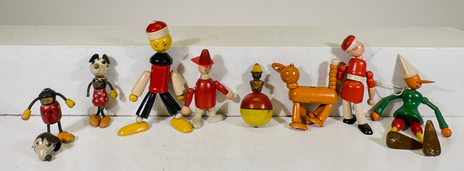 An Assortment of Wooden Flex Toys - Jaymar and Walt Disney Productions (1 of 2)