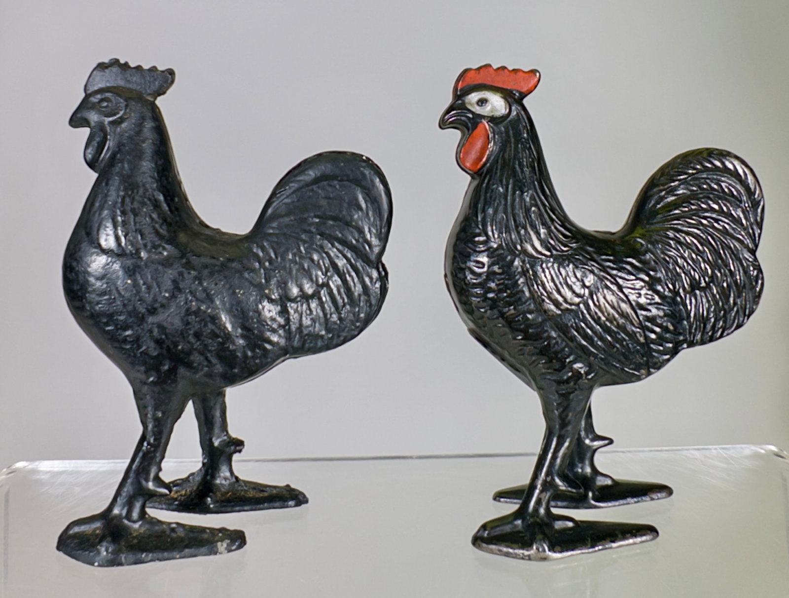 Two Rooster Still Bank - One Cast Iron and One Aluminum: American 1915/1950