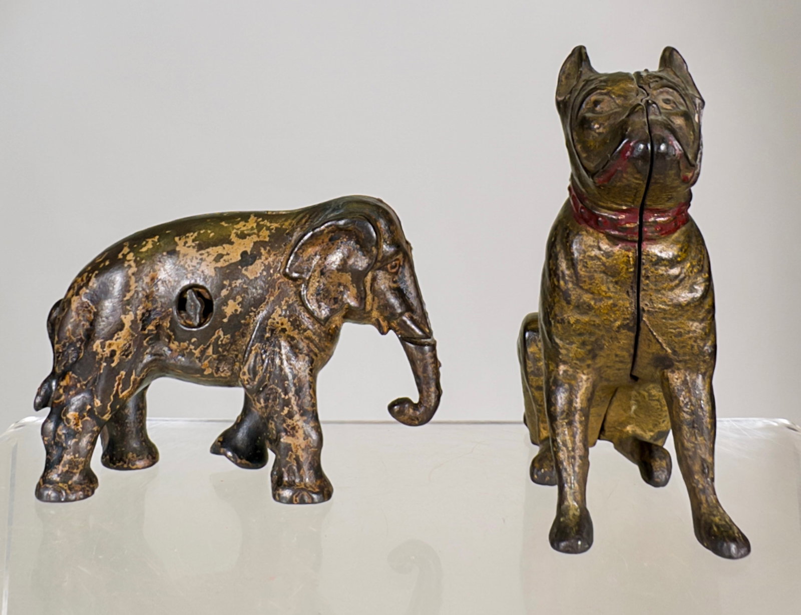 Two Cast Iron Animal Banks - Stiff Legged Elephant/Seated Bulldog: American 1920 - 4 1/2"T